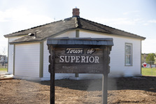 Rebuilt Historical Museum with historic Town of Superior sign