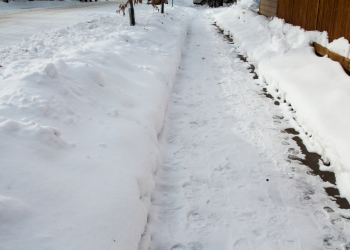 Snow on a sidewalk