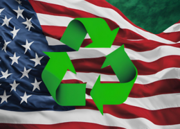 American flag with green recycling logo. 