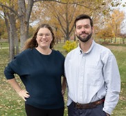Alexis Bullen and Austin Everett of the Sustainability team pose together