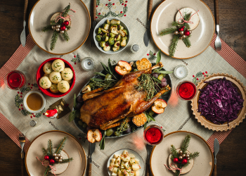 A Christmas meal with roast turkey and sides