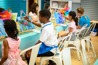 Kids painting at a Createry under the sea workshop