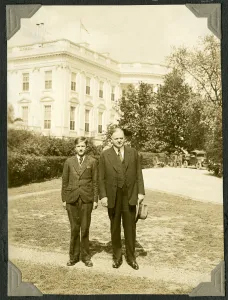 Bryan and Hover standing outside the White House.