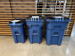 Three sizes of garbage carts at the Superior Community Center