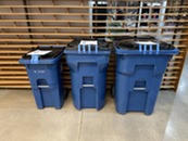 Three sizes of garbage carts at the Superior Community Center