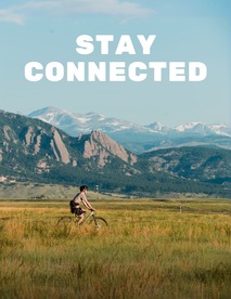 Stay Connected text on photo of a person biking in front of the Flatirons