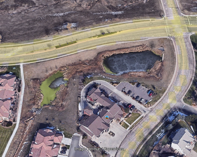 Aerial image of the retention pond at Coalton and Indiana in Superior
