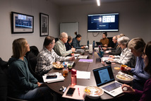 The Open Space Advisory Committee discusses topics during a meeting