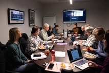 The Open Space Advisory Committee discusses topics during a meeting