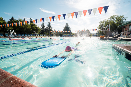 A person swims in Superior