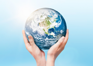 Pair of hands holding the Earth