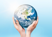 Pair of hands holding the Earth