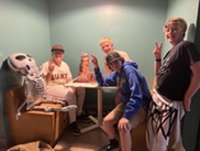 Four kids pose for a photo at the Superior Community Center during Teen Night