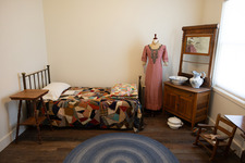 A historical bedroom set up inside one of Superior's Historical Museums