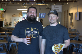 Co-owners of Pat's Tap pose for a photo