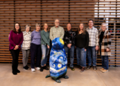 Superior's Open Space Advisory Committee poses for a photo with a prairie dog statue