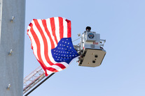 Flag raised by Moutain View Fire Rescue blowing in the wind.
