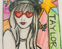 drawing of taylor swift made from markers and colored pencil with a star on a multi colored background and caption "TAYLOR"