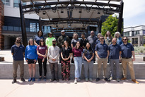Superior's Parks, Recreation, and Open Space team poses in Downtown Superior