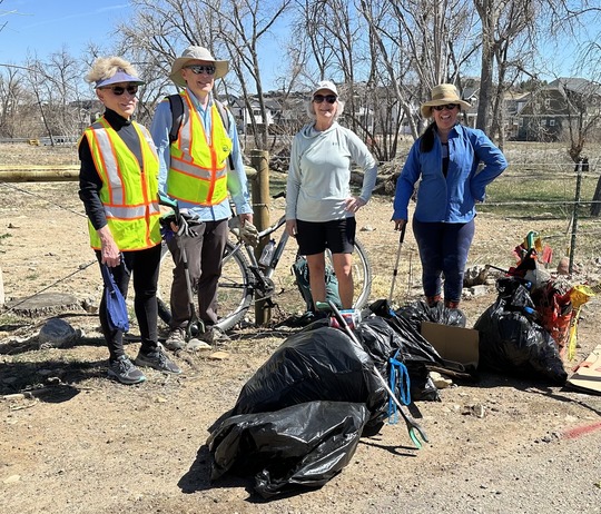 WHET volunteers at a community clean up day