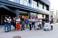 Mayor Mark Lacis, Superior Town Council members, and others pose for a ribbon cutting at the new Downtown Superior Civic Space