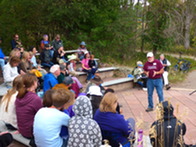A crowd listens during a Boulder Valley Spellbinders storytelling event