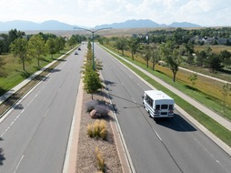 Shuttle heading off to lot 15 to pick up passengers.
