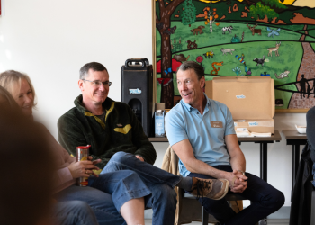 Council Member Mike Foster and Mayor Pro Tem Jason Serbu smile during First Fridays Coffee