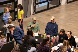 A crowd of people hang out at the Superior Community Center