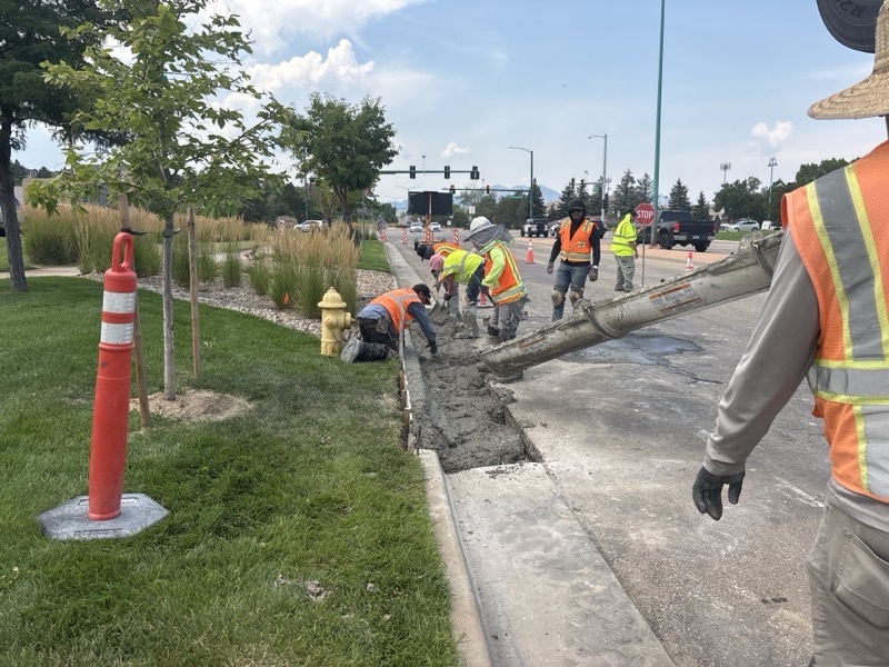 Crews work on the Coalton Road mill and overlay project