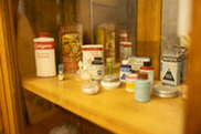 A collection of bottles and tinctures on display at the Superior Historical Museum.