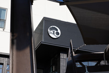 town of superior logo against a black backdrop on the side of the superior civic space from the stage view