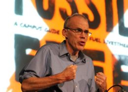Author Bill McKibben speaking at a conference.
