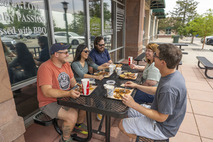 Friends enjoying a meal.