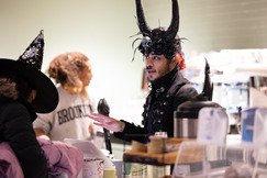 Serendipity employee dressed up in a demon costume.
