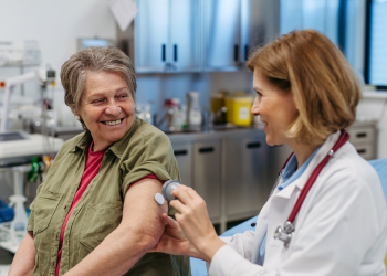 A doctor and patient with diabetes discuss care