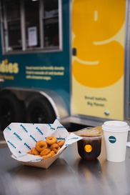 Goldies Mini donuts, fresh coffee in front of a food truck