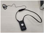 An assisted listening device sits on a table