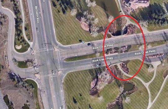 Aerial view of Rock Creek Parkway with a red line around the underpass that will be closed.