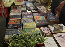 A variety of books arranged on a table at a recent book swap.