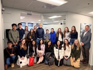 A group of students in Superior's Youth Leadership Council smile for a photo
