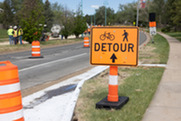 Orange detour sign dictating construction on Rock Creek Parkway