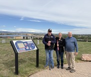 Members of the Superior Veterans Group pose for a photo at the historical cemetery