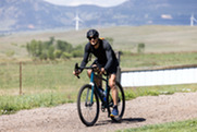 A man bikes at the Coalton Trailhead