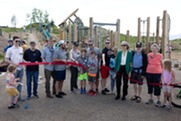 Members of Superior's Parks and Recreation Advisory Committee pose for a photo at a ribbon cutting event