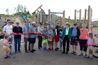 Members of Superior's Parks and Recreation Advisory Committee pose for a photo at a ribbon cutting event