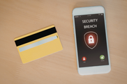 Cell phone with screen reading security breach and a credit card