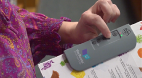 VoX Reader player on side of book 