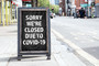 Sign stating business is closed due to COVID-19