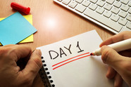 Notepad that says, "Day 1" on it.